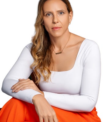 Portrait of Ami Rivera, REALTOR®, SRS, ABR, C2EX, PSA, RENE, AHWD.